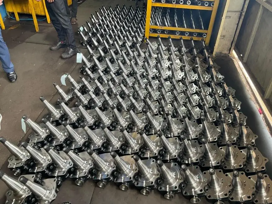 B8 · T2 PPAP · production batch of forged stems lined up on the floor, sign off ready
