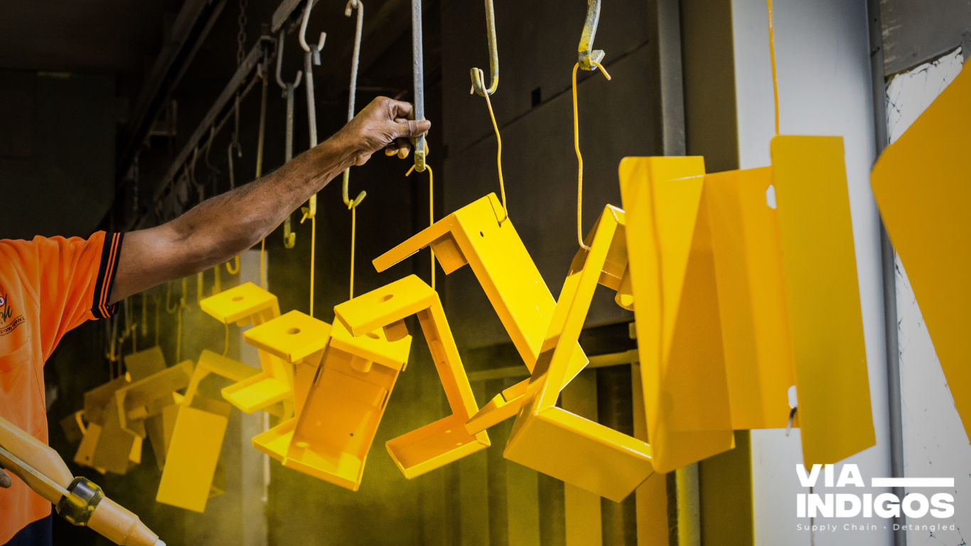 Powder Coating: Components securely placed on jigs for a flawless and durable powder coating finish.