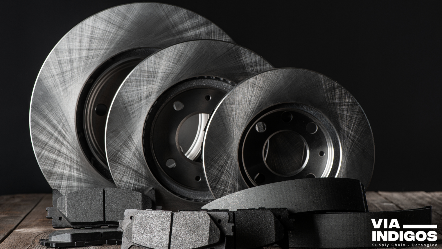 High-performance brake rotors and pads with coated and slotted rotor surface for optimal performance.