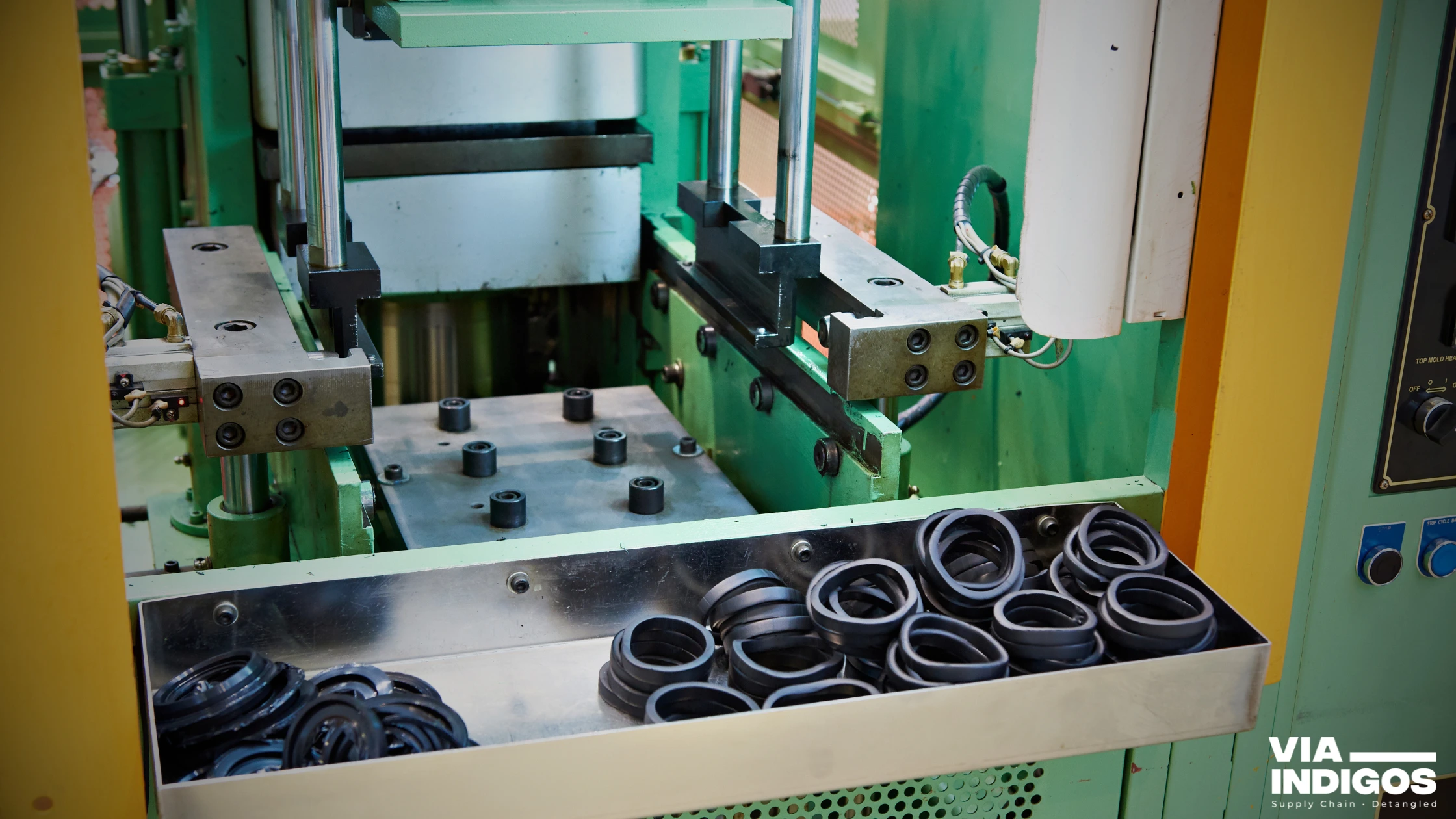 Durometer and dimensional check on a cured rubber profile during first article inspection at our India partner facility