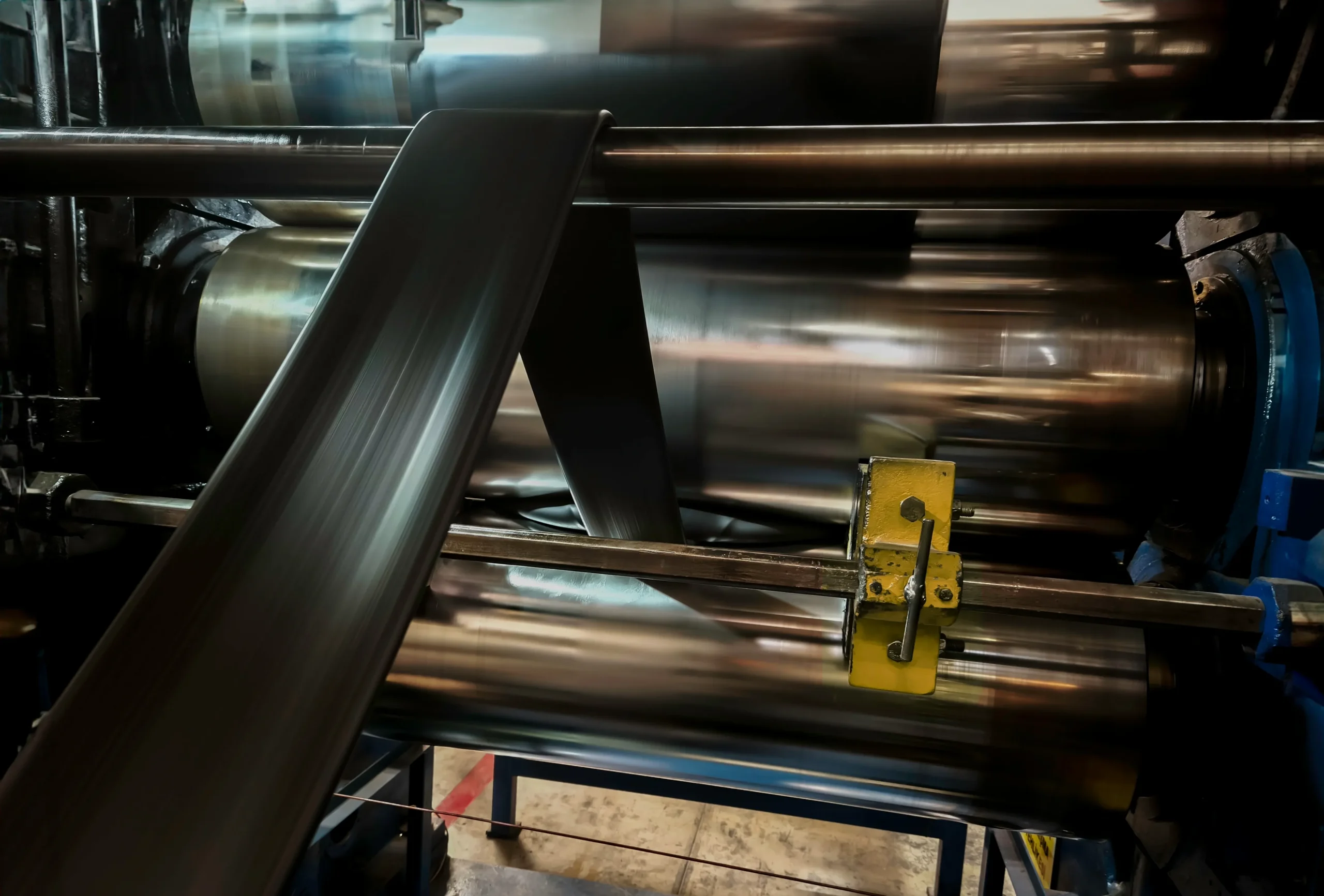 Wide view of the rubber extrusion floor at our India partner facility, mixing extrusion and curing under one roof