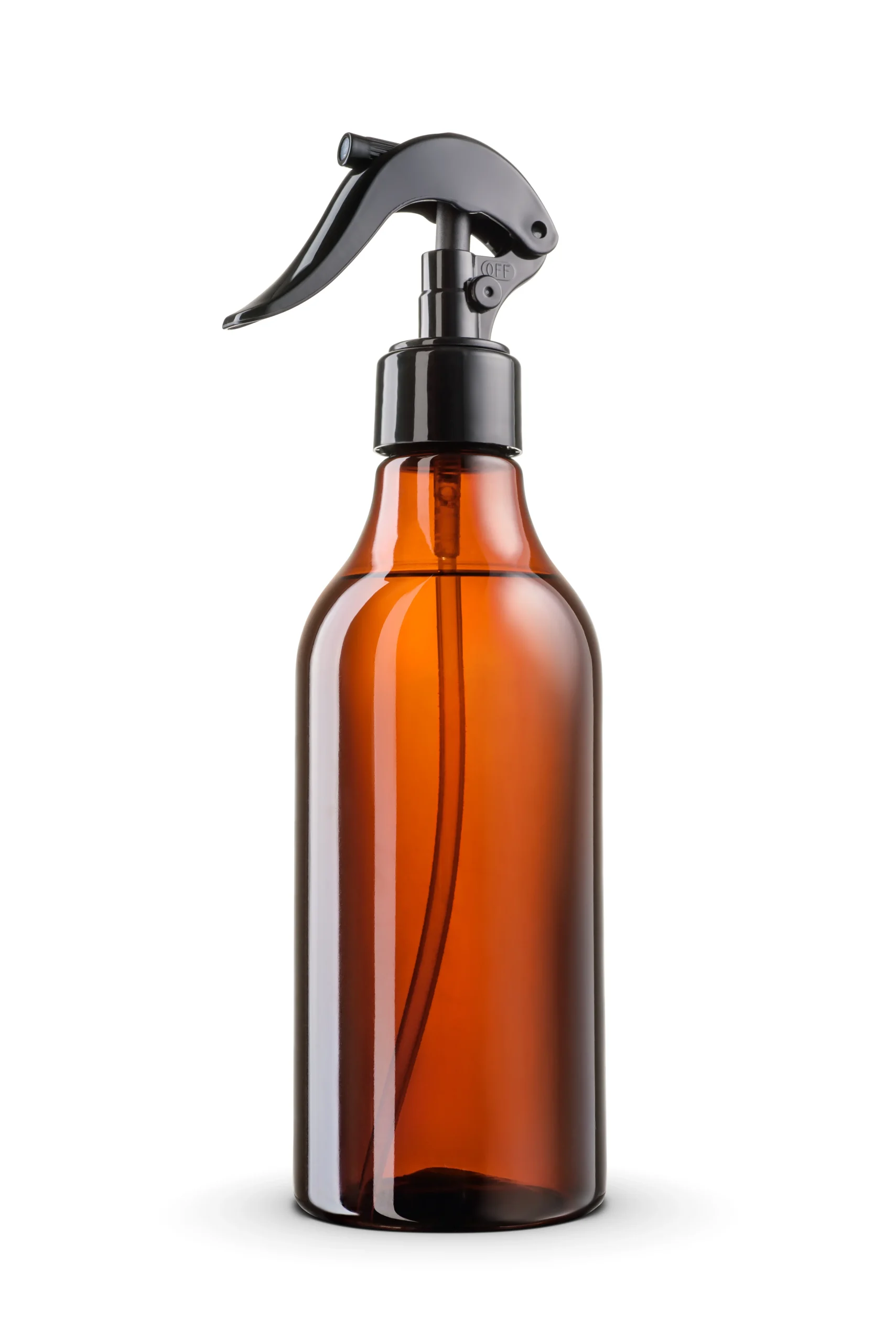 Blow molded spray bottles with trigger sprayers during assembly at our India partner facility