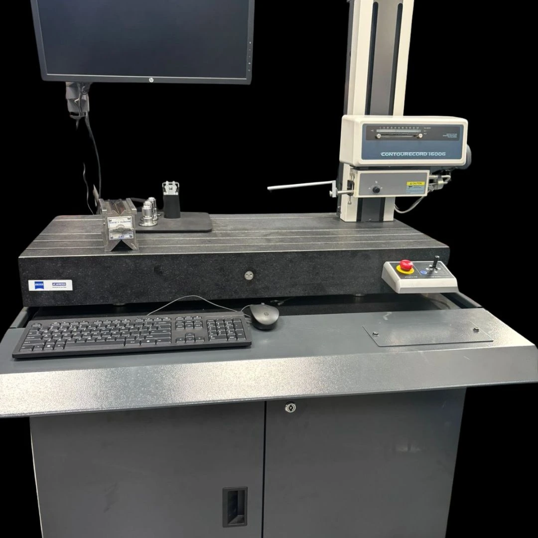First article inspection on a coordinate measuring machine at a VIA INDIGOS partner facility in India, a machined part on the CMM bed against its drawing callouts