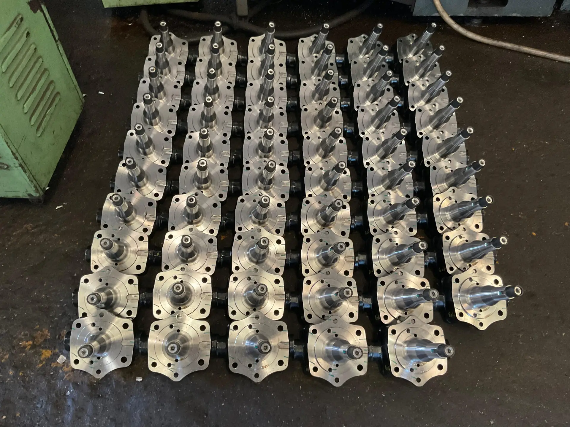 Heavy duty forged and CNC machined steering knuckles for automotive suspension programs, inspected at a VIA INDIGOS partner facility in India