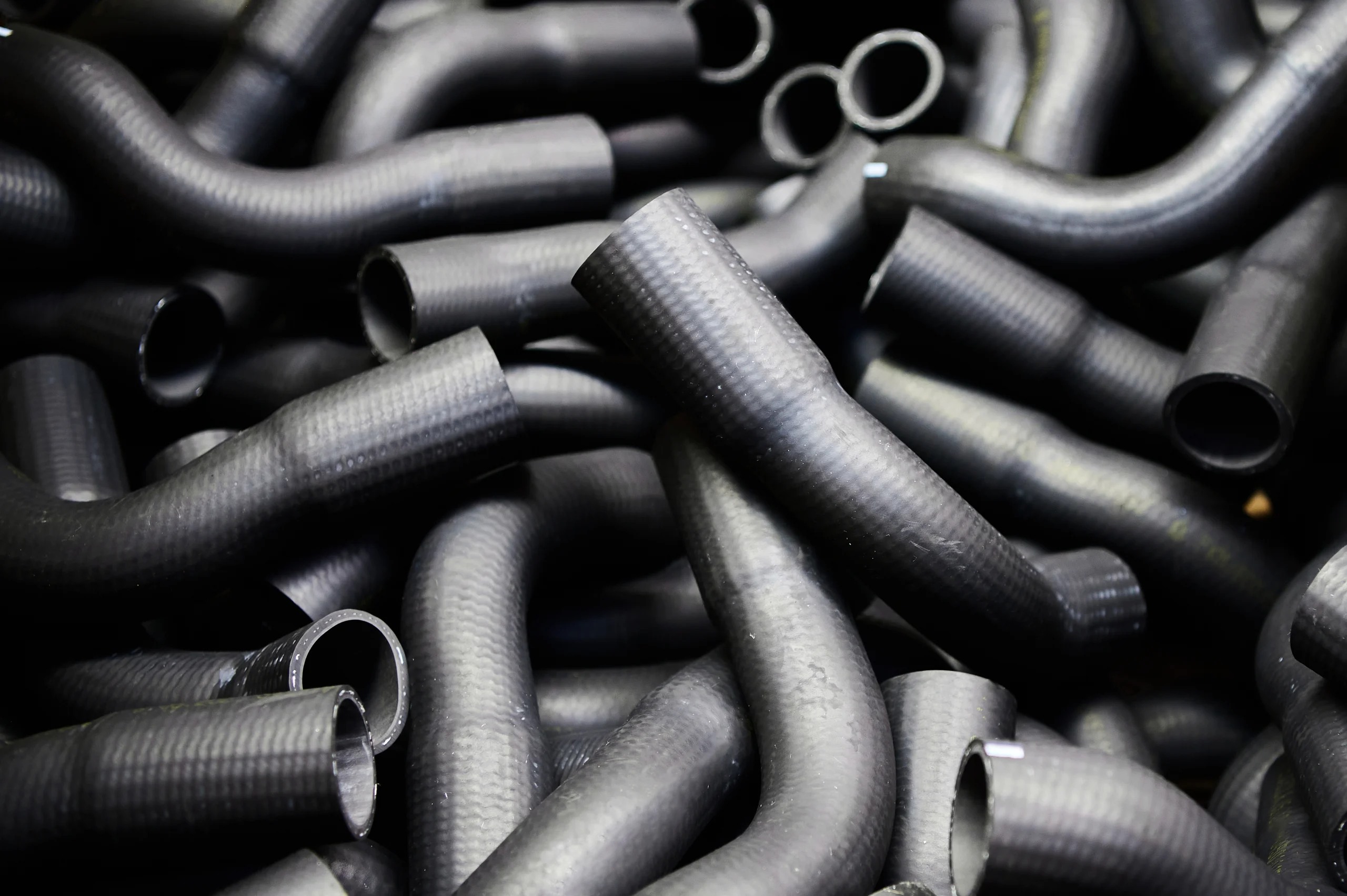 Extruded rubber hose and tubing after vulcanizing at our India partner facility