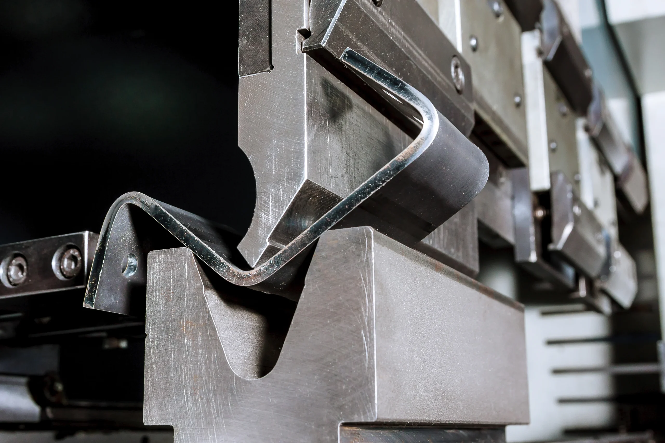 CNC press brake bending a sheet metal bracket at our India partner facility