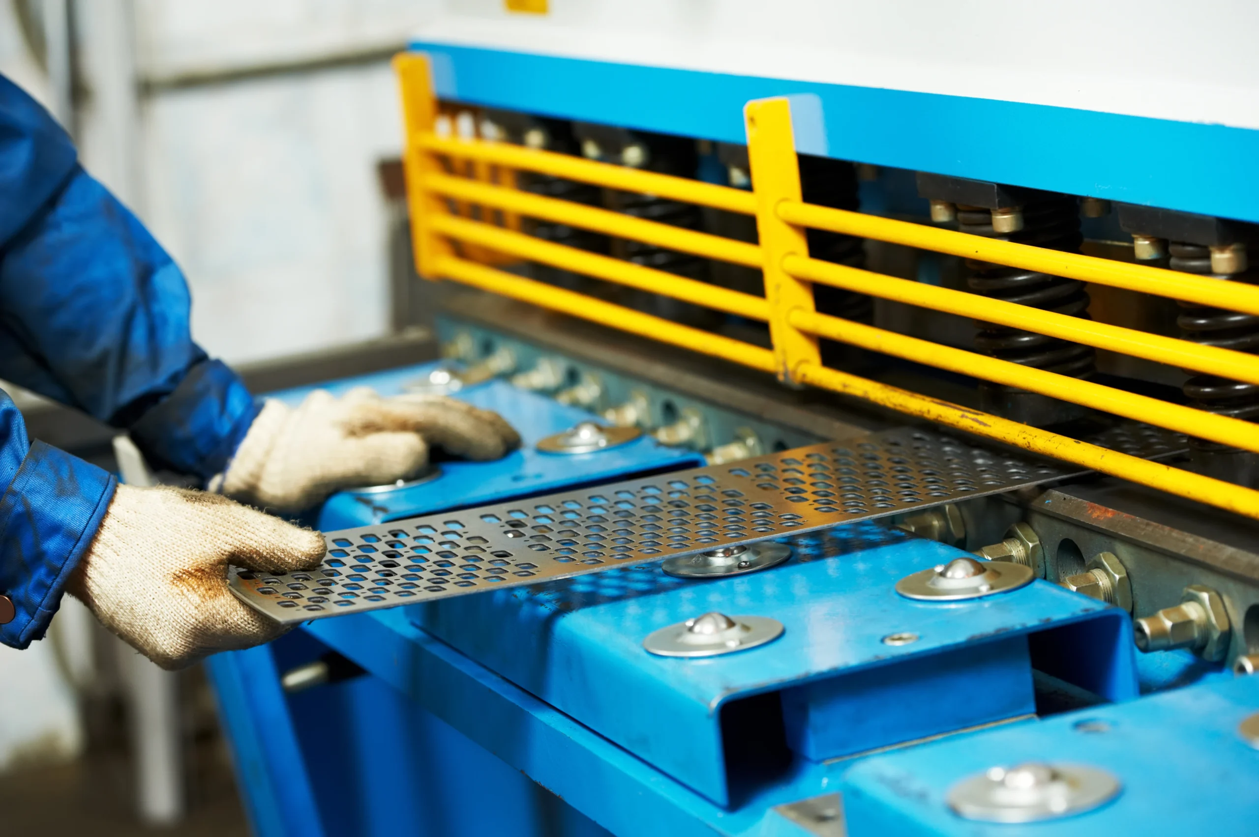Shearing line cutting coil to blank size on the stamping floor at our India partner facility