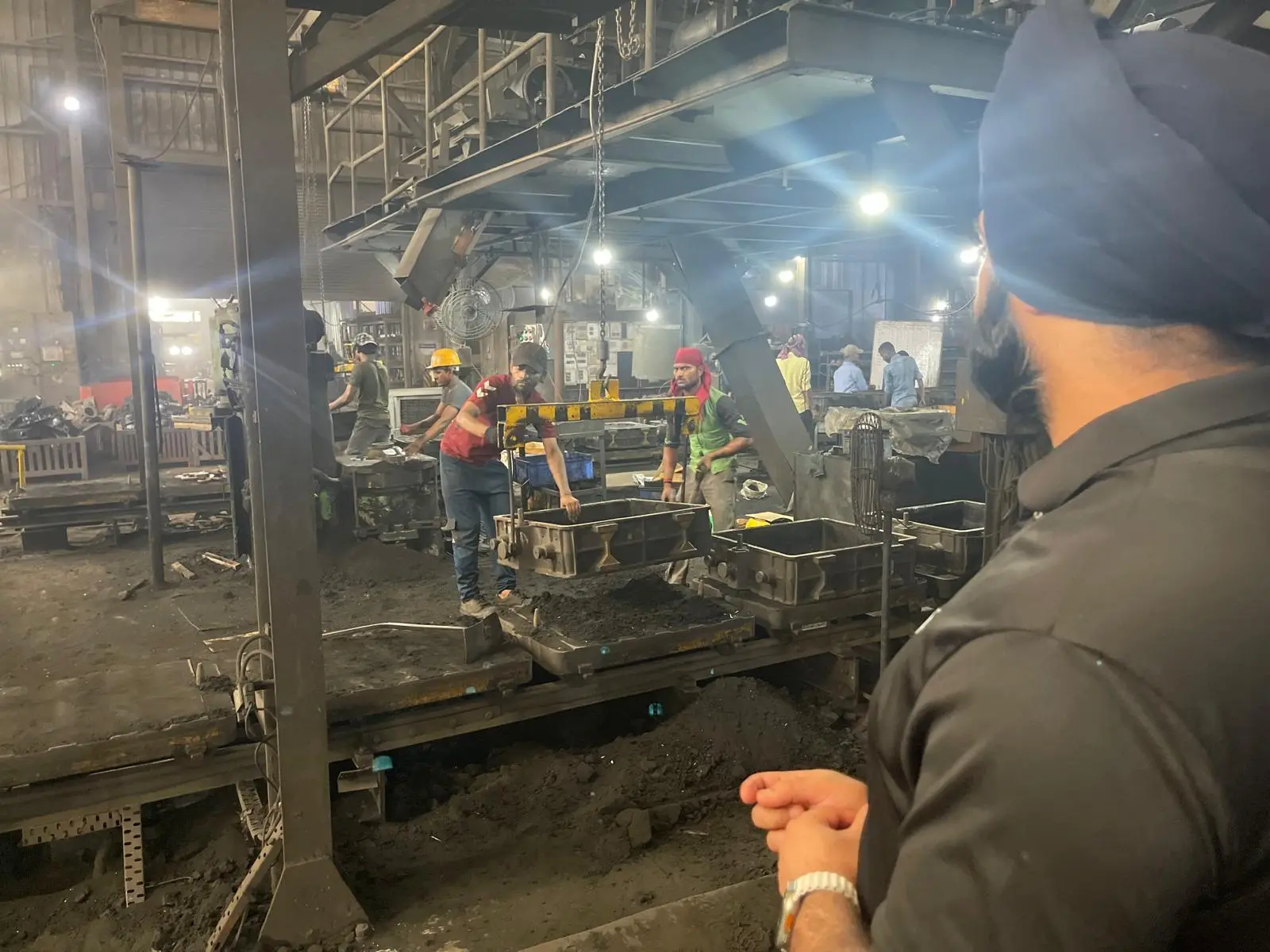 Green sand casting line running on an audited foundry floor in India