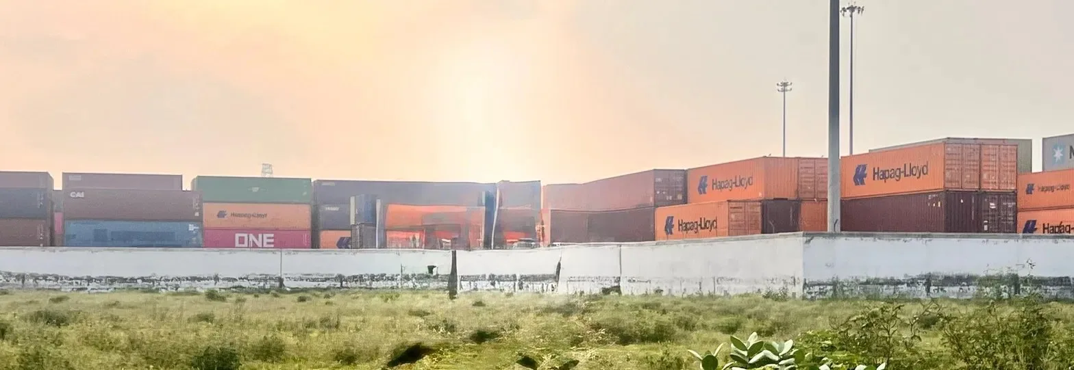 Sea freight containers stacked at Nhava Sheva and Mundra style port terminal in India, Hapag-Lloyd and ONE units on the India to US ocean freight lane that VIA INDIGOS uses for FOB and DDP casting shipments to Los Angeles, Long Beach, Newark and Houston