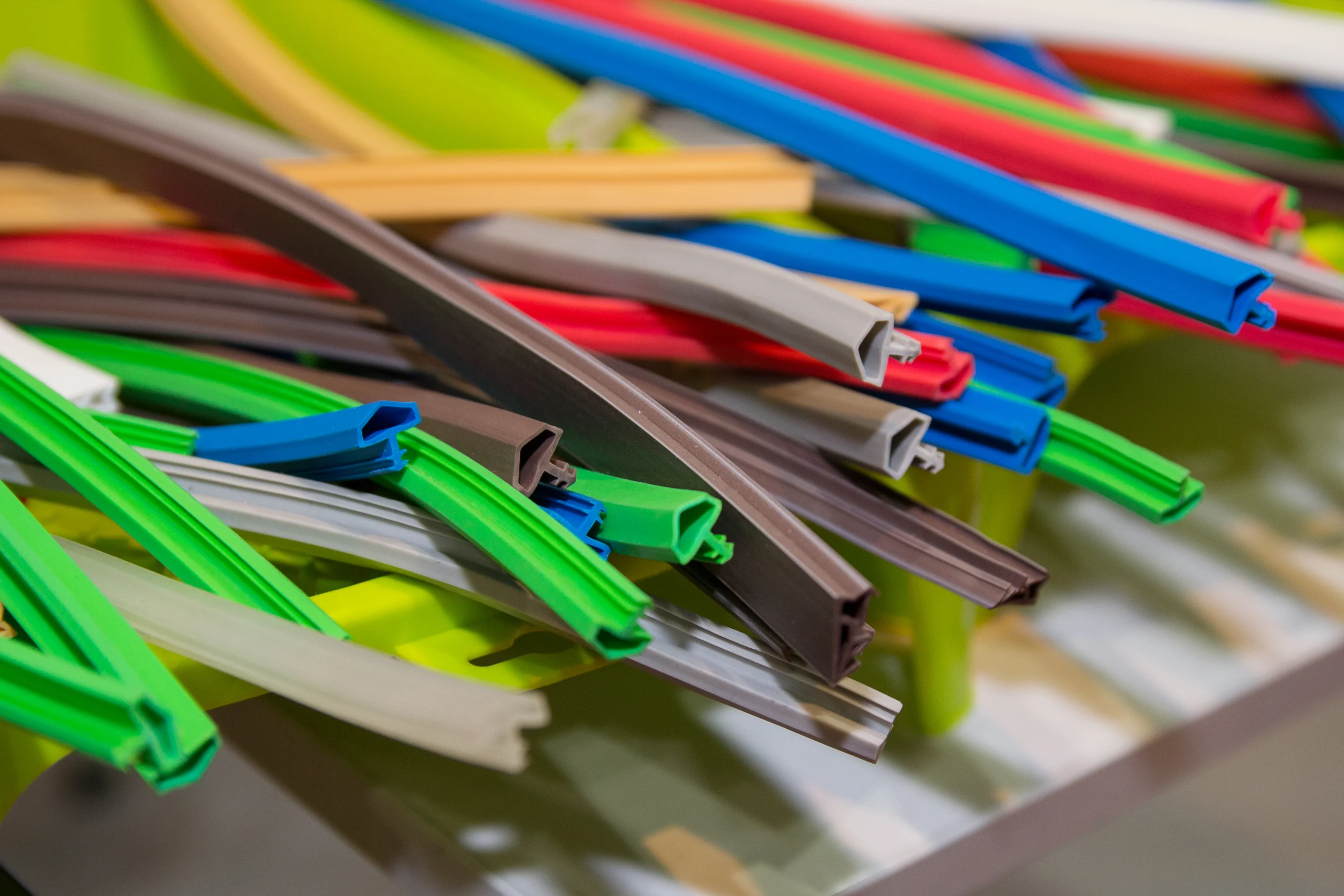 Colorful co-extruded rubber profiles in dense and sponge sections at our India partner facility