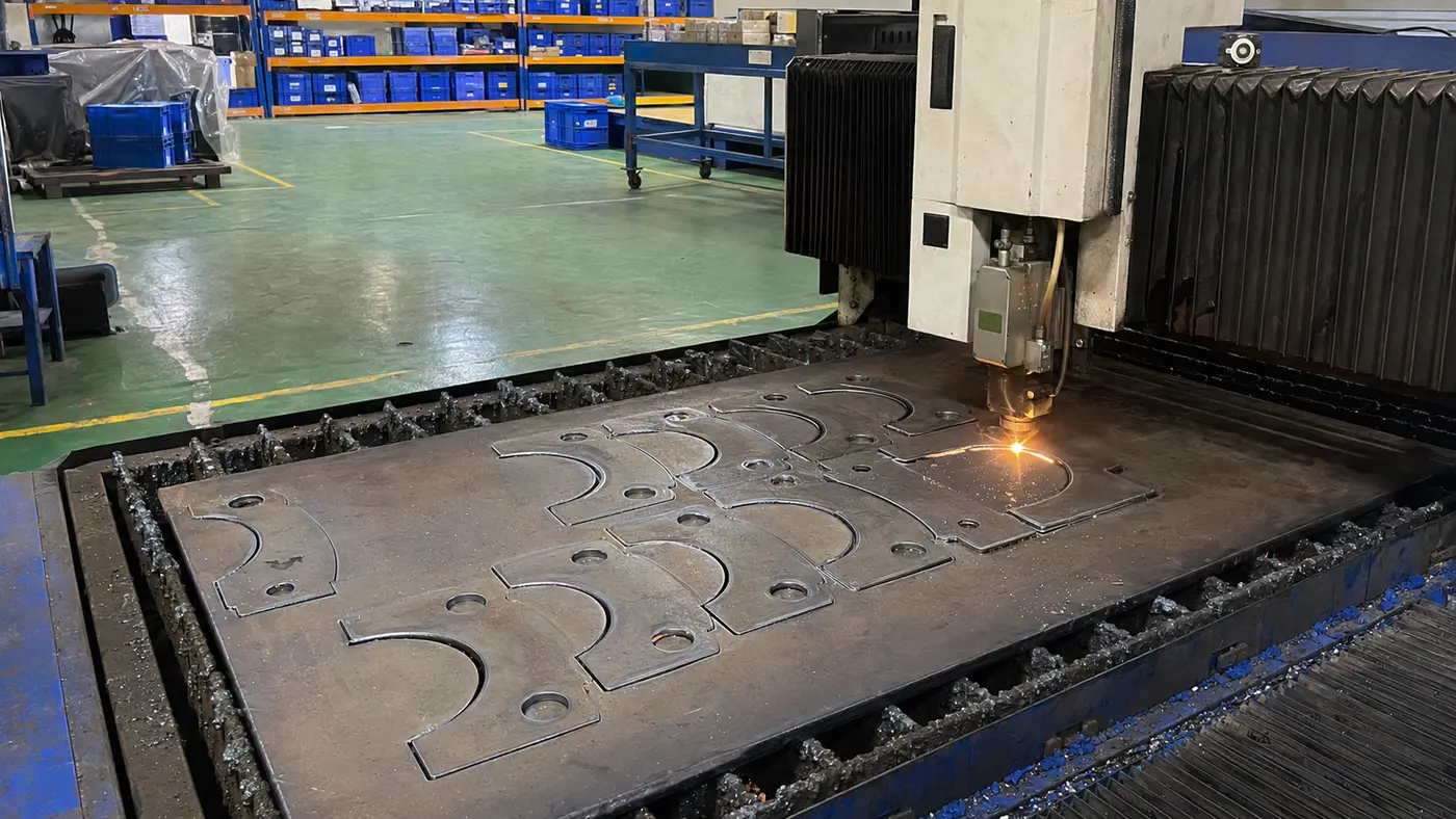 Thick steel caliper bracket blank during laser or plasma cutting in India