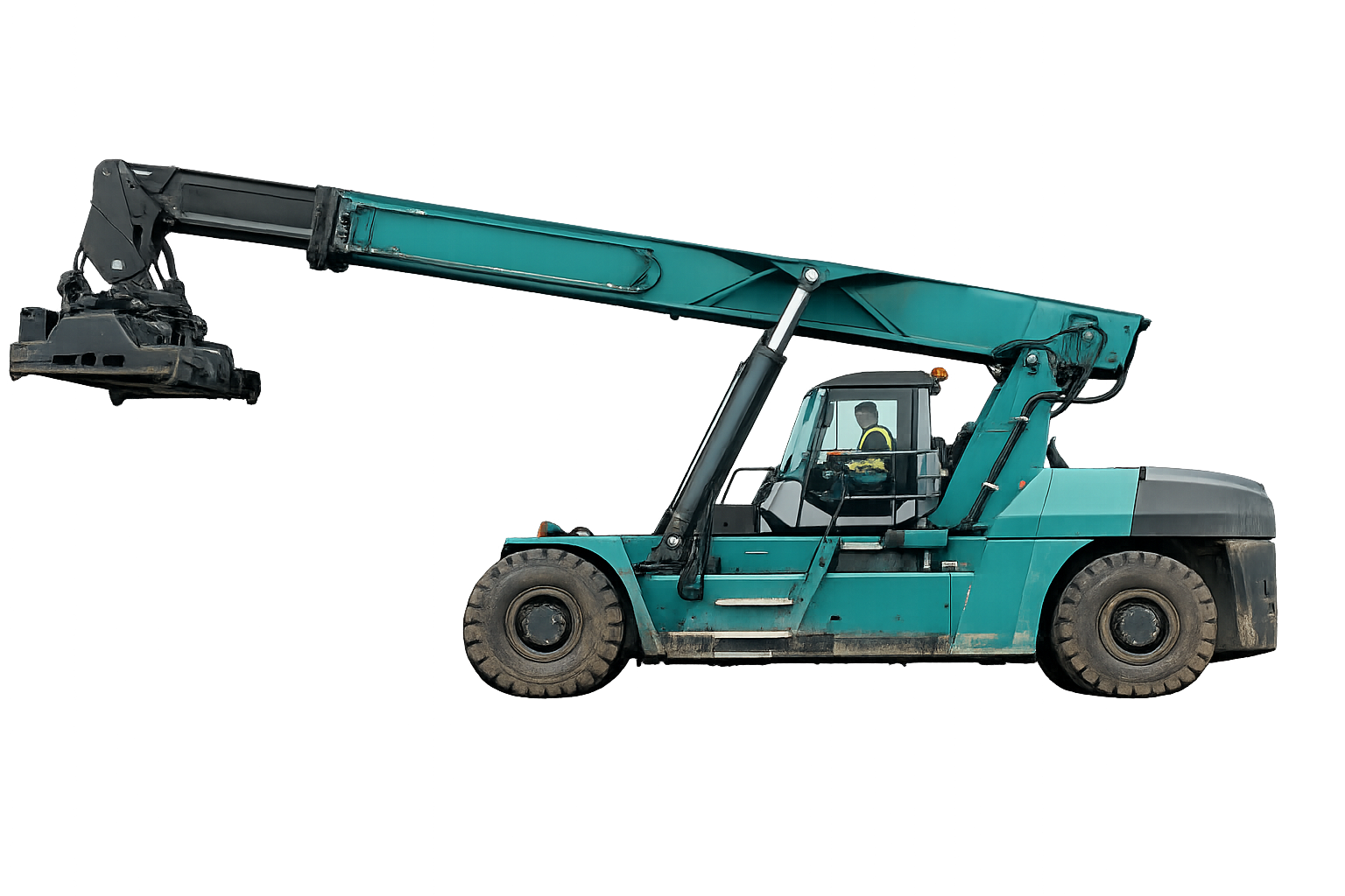 Teal reach stacker with the boom raised and a driver at the controls at the container freight station in Nhava Sheva