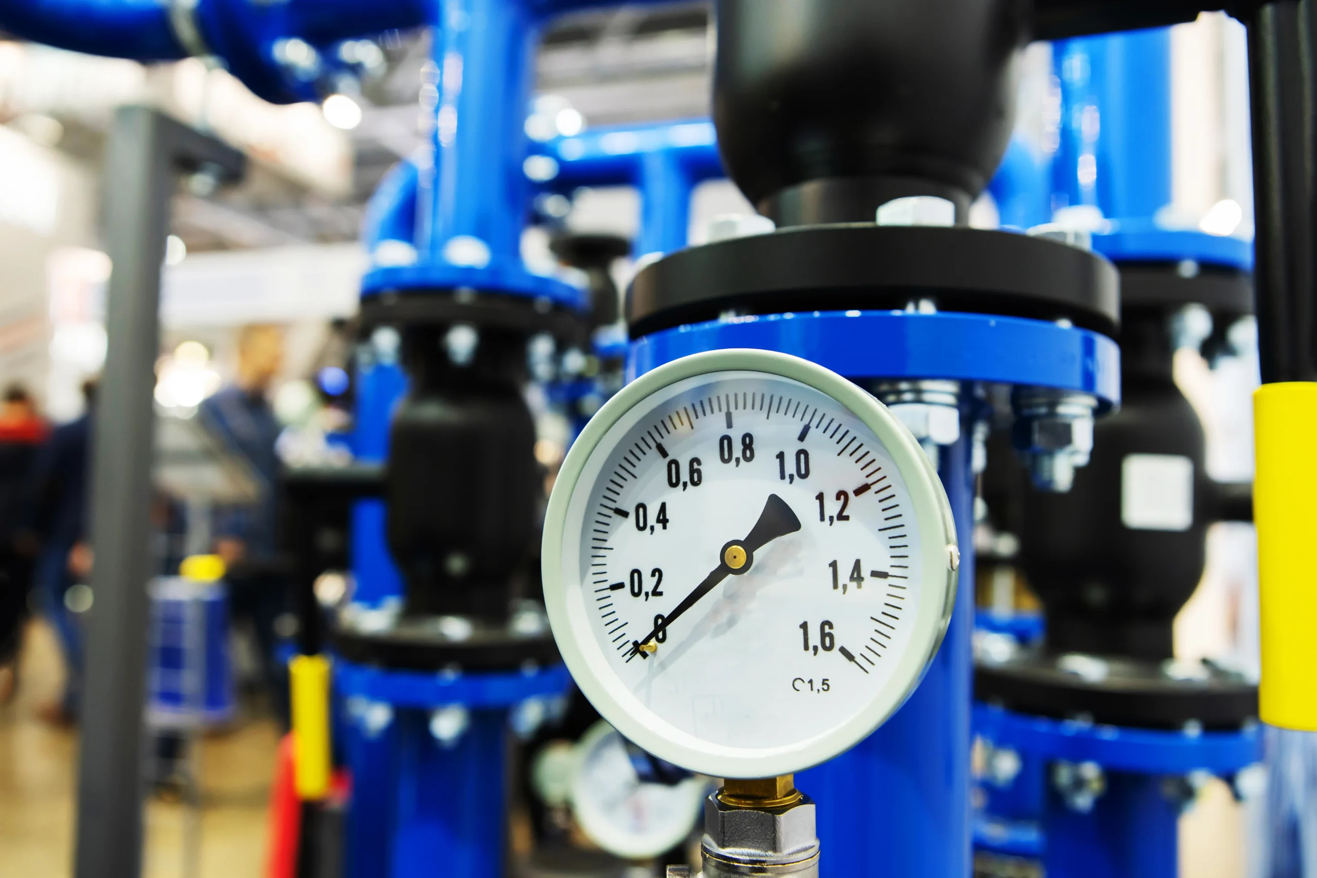 Pressure gauge reading on the hydraulic leak test rig during a pump assembly test at our India partner facility